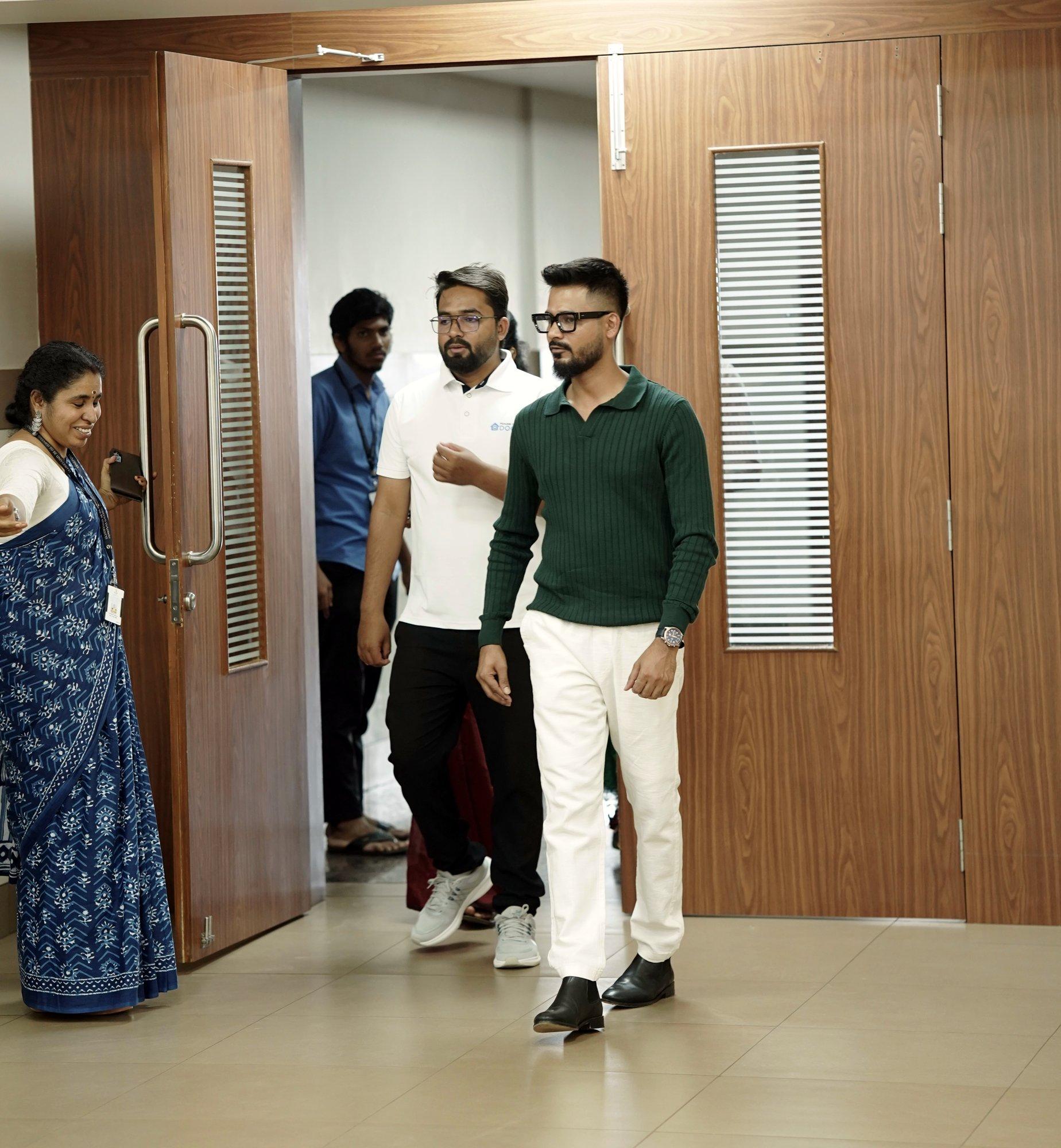 Roni Paul arriving with his team for a college talk